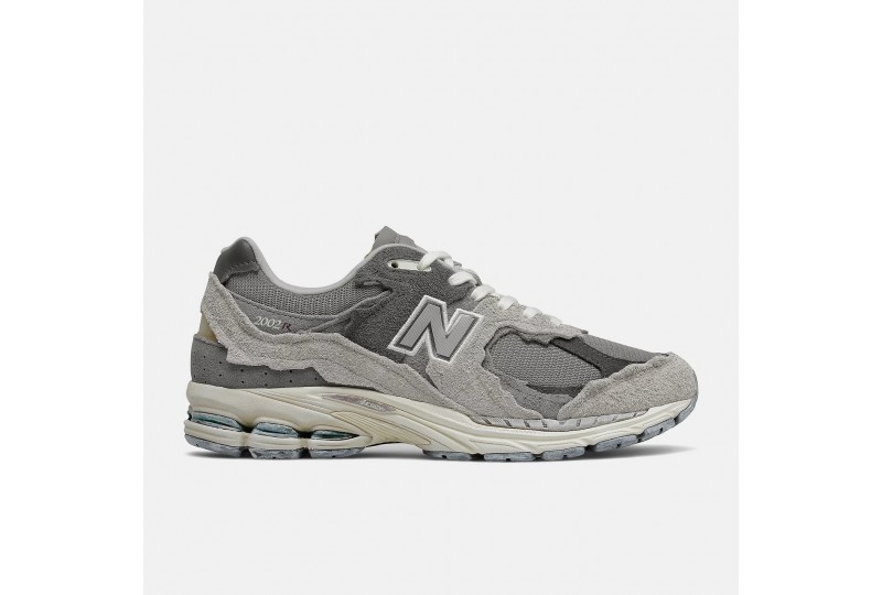 NEW BALANCE UOMO 2002R...